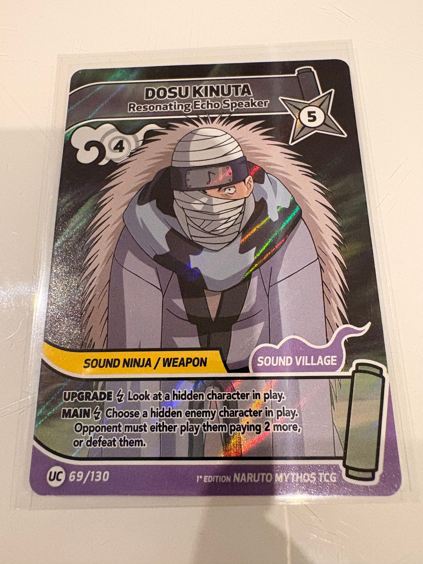 Carte Naruto Mythos TCG : Dosu Kinuta – Resonating Echo Speaker (Uncommon Holo) - 69/130 - 1st Edition