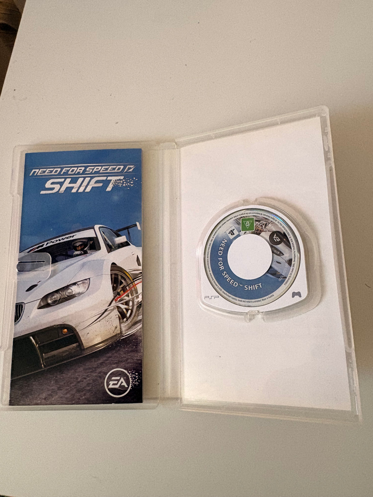 Console Sony PSP Noire (Batterie Neuve) + Chargeur, Housse & 2 Jeux Need for Speed