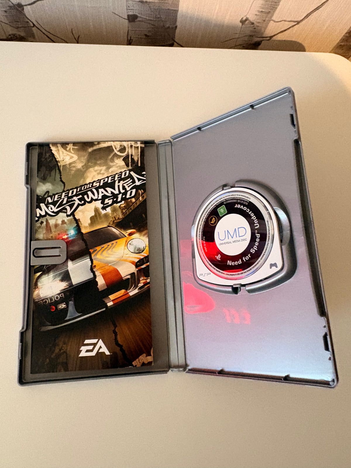 Console Sony PSP Noire (Batterie Neuve) + Chargeur, Housse & 2 Jeux Need for Speed