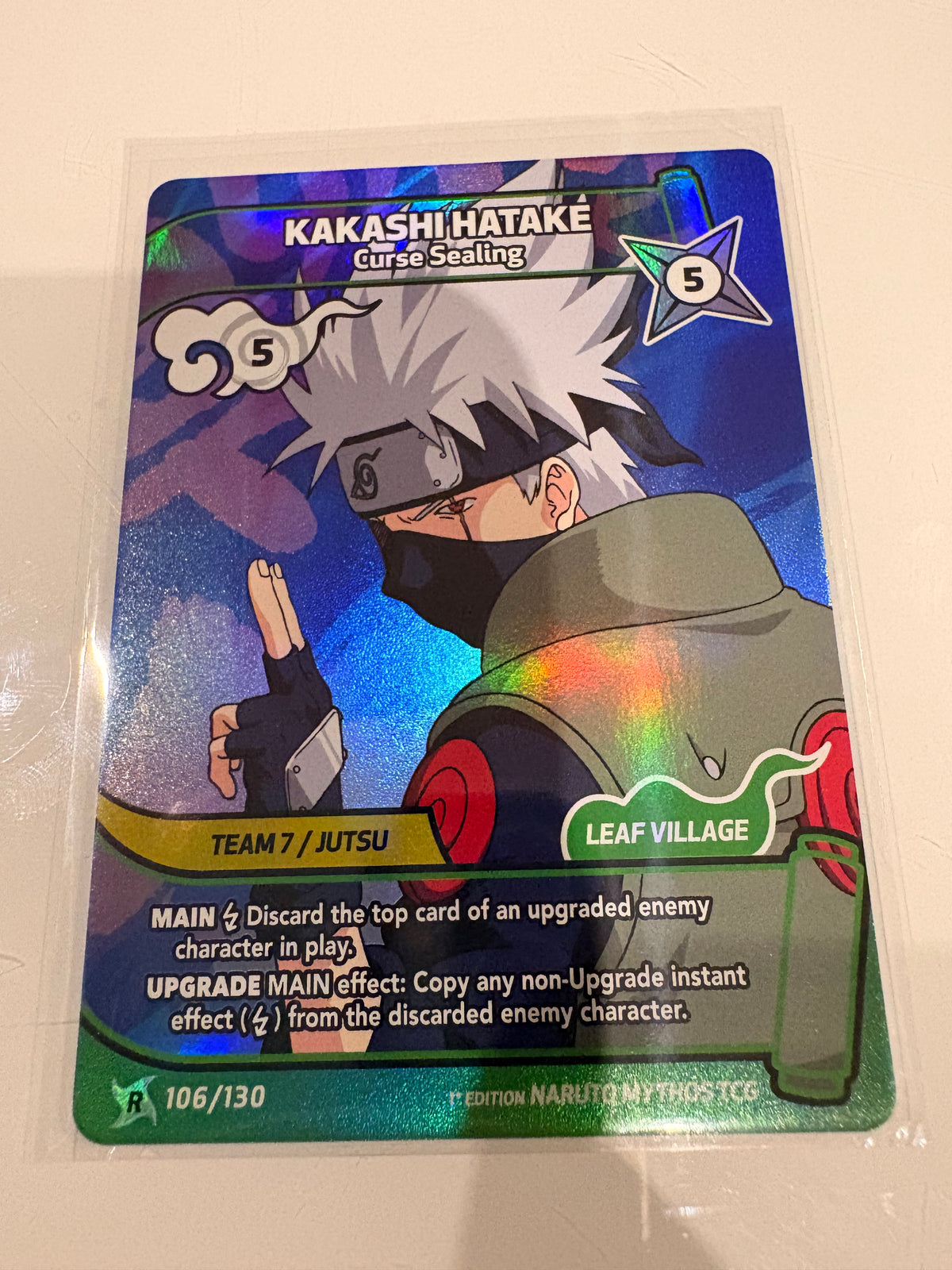 Carte Naruto Mythos TCG : Kakashi Hatake – Curse Sealing (Rare Holo) - 106/130 - 1st Edition