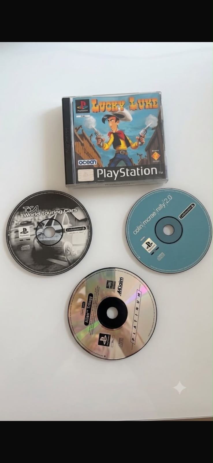 PlayStation 1 (PSOne)-Paket + Spiele