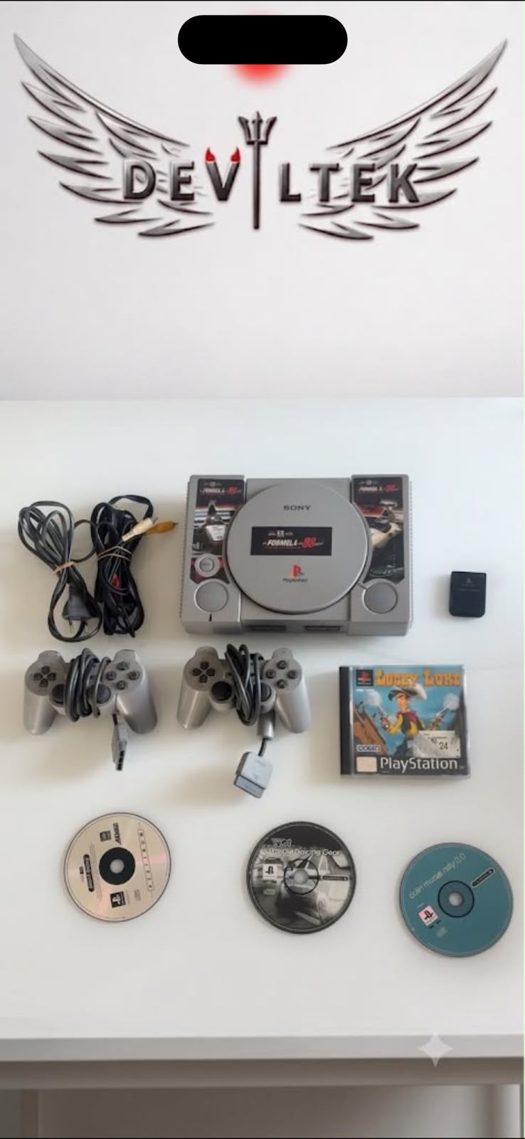 PlayStation 1 (PSOne)-Paket + Spiele