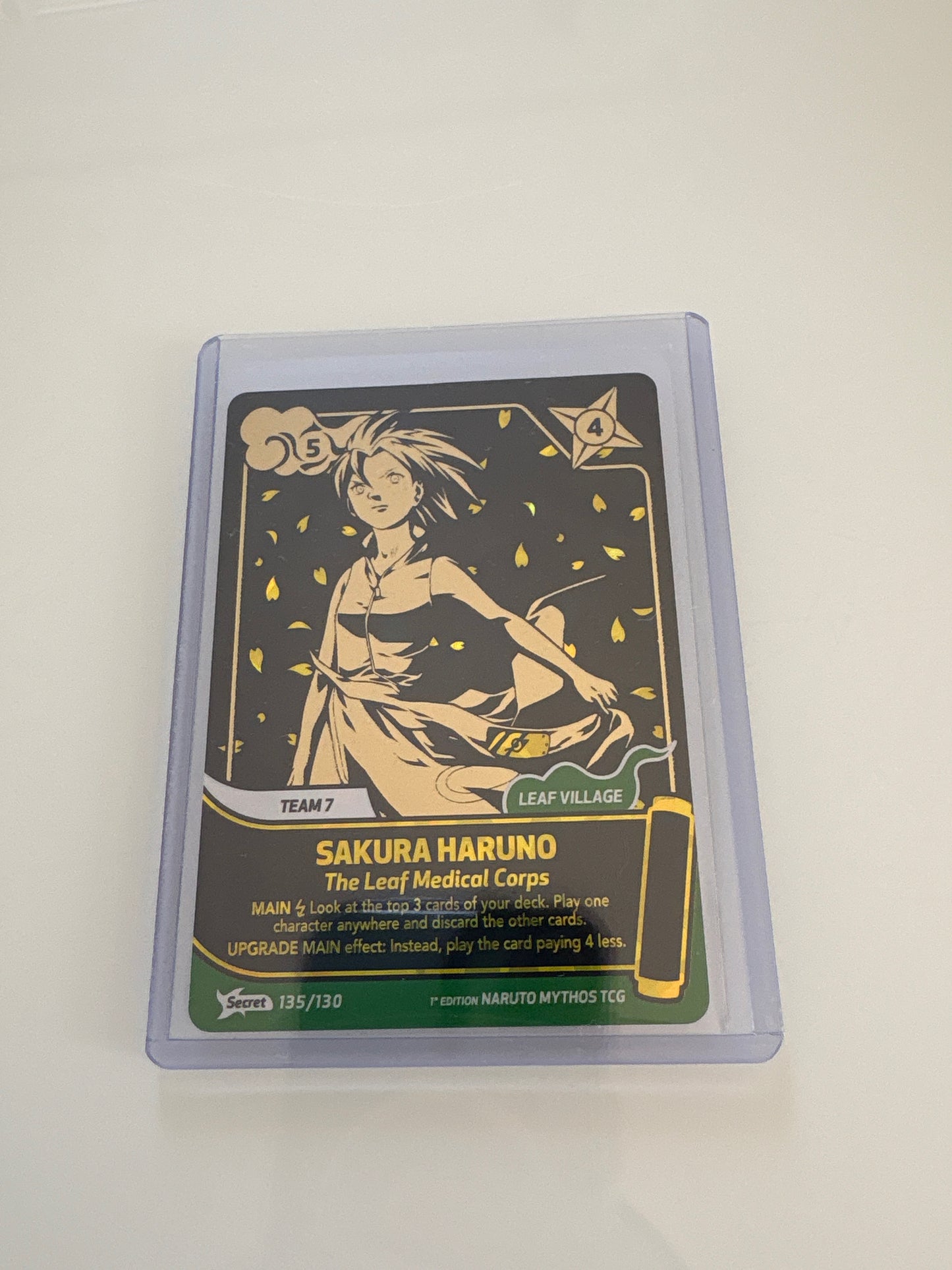 Carte Naruto Mythos TCG : Sakura Haruno – The Leaf Medical Corps (Gold Secret Rare) - 135/130 - 1st Edition